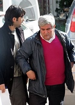 An unidentified former colonel (R) is pictured after his arrest by Turkish police on February 22, in Istanbul. An unidentified former colonel (R) is pictured after his arrest by Turkish police on February 22, in Istanbul.