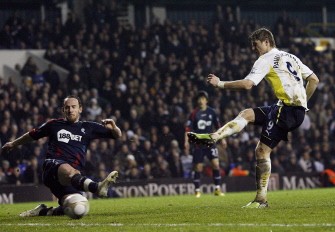 Tottenham Hotspur's Russian striker Roman Pavlyuchenko (R) scores the fourth goal during their FA Cup fifth round replay football match against Bolton Wanderers at White Hart Lane on February 24, 2010. AFP PHOTO Tottenham Hotspur's Russian striker Roman Pavlyuchenko (R) scores the fourth goal during their FA Cup fifth round replay football match against Bolton Wanderers at White Hart Lane on February 24, 2010. AFP PHOTO