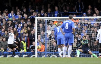 Manchester City's striker Carlos Tevez (L) scores a penalty during the English Premier League football match between Chelsea and Manchester City at Stamford Bridge on February 27, 2010. AFP PHOTO Manchester City's striker Carlos Tevez (L) scores a penalty during the English Premier League football match between Chelsea and Manchester City at Stamford Bridge on February 27, 2010. AFP PHOTO