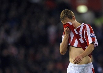 Ryan Shawcross walks from the field after being sent off by referee Peter Walton (not pictured) for a challenge on Arsenal's Welsh player Aaron Ramsey (not pictured) on February 27, 2010. AFP PHOTO Ryan Shawcross walks from the field after being sent off by referee Peter Walton (not pictured) for a challenge on Arsenal's Welsh player Aaron Ramsey (not pictured) on February 27, 2010. AFP PHOTO