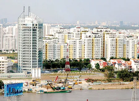 Từ một vùng đất không màu mỡ, ngày nay quận 7 TPHCM đã phát triển thành một khu đô thị lớn. Ảnh: CAO THĂNG Từ một vùng đất không màu mỡ, ngày nay quận 7 TPHCM đã phát triển thành một khu đô thị lớn. Ảnh: CAO THĂNG