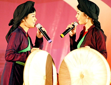Một buổi biểu diễn quan họ. Ảnh: AN DUNG Một buổi biểu diễn quan họ. Ảnh: AN DUNG