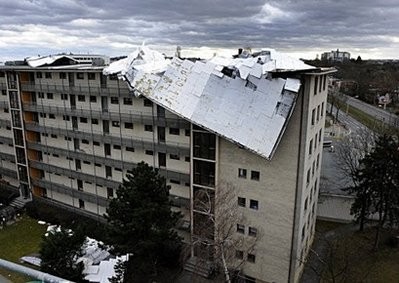The roof of an apartment building hangs to the side of the house after the heavy storm Xynthia passed through Mainz, western Germany. (AFP Photo) The roof of an apartment building hangs to the side of the house after the heavy storm Xynthia passed through Mainz, western Germany. (AFP Photo)