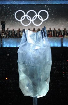 The extinguished Olympic cauldron is pictured with olympic rings during the closing ceremony at the BC Place in Vancouver on February 28, 2010. AFP PHOTO