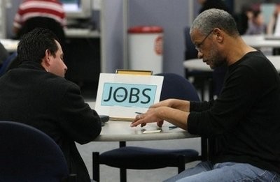 A job seeker (L) talks with a career counselor at a job center in San Francisco, California in January 2010. A job seeker (L) talks with a career counselor at a job center in San Francisco, California in January 2010.