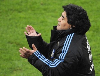 Argentina's coach Diego Maradona applauds during the friendly football match Germany vs Argentina in the southern German city of Munich on March 3, 2010. AFP photo Argentina's coach Diego Maradona applauds during the friendly football match Germany vs Argentina in the southern German city of Munich on March 3, 2010. AFP photo