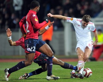 Liverpool's forward Steven Gerrard (R) vies with Lille's french defender Franck Beria (L) during the UEFA Europa League football match between Lille and Liverpool on March 11, 2010. AFP PHOTO Liverpool's forward Steven Gerrard (R) vies with Lille's french defender Franck Beria (L) during the UEFA Europa League football match between Lille and Liverpool on March 11, 2010. AFP PHOTO