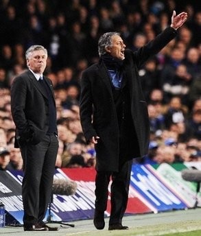 Chelsea's manager Carlo Ancelotti (left) watches as Inter Milan's coach Jose Mourinho directs his players during their second leg round of 16 Champions League match at home to Chelsea at Stamford Bridge football stadium, London Chelsea's manager Carlo Ancelotti (left) watches as Inter Milan's coach Jose Mourinho directs his players during their second leg round of 16 Champions League match at home to Chelsea at Stamford Bridge football stadium, London