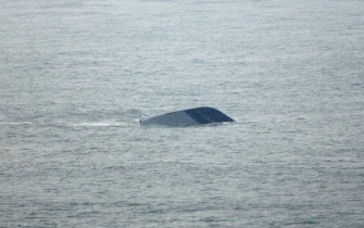 In a handout picture released by the Ongjin County Office shows a South Korean Navy Pohang class Patrol Combat Corvette PCC-772 Chonan sunk near Baengnyeong island off Incheon, west of Seoul on March 27, 2010. AFP PHOTO In a handout picture released by the Ongjin County Office shows a South Korean Navy Pohang class Patrol Combat Corvette PCC-772 Chonan sunk near Baengnyeong island off Incheon, west of Seoul on March 27, 2010. AFP PHOTO