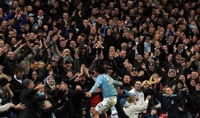 Carlos Tevez celebrates scoring his third goal against Wigan Athletic in Manchester, on March 29, 2010. AFP photo Carlos Tevez celebrates scoring his third goal against Wigan Athletic in Manchester, on March 29, 2010. AFP photo