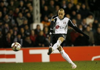 Fulham's English striker Bobby Zamora scores a goal against Wolfsburg during their UEFA Europa League, quarter-final, in London, England, on April 1, 2010. AFP PHOTO Fulham's English striker Bobby Zamora scores a goal against Wolfsburg during their UEFA Europa League, quarter-final, in London, England, on April 1, 2010. AFP PHOTO