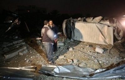 (AFP file) Palestinians inspect the site of a destroyed factory after an Israeli airstrike in Gaza City. (AFP file) Palestinians inspect the site of a destroyed factory after an Israeli airstrike in Gaza City.