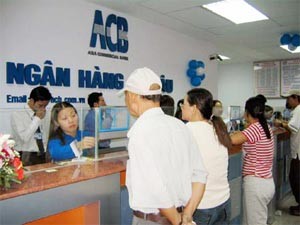 At an ACB branch in Ho Chi Minh City At an ACB branch in Ho Chi Minh City
