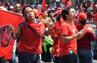 Red shirts supporters parade during anti-government protests in Bangkok on April 3, 2010. AFP photo Red shirts supporters parade during anti-government protests in Bangkok on April 3, 2010. AFP photo