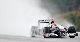 Mercedes driver Michael Schumacher of Germany powers his car in the rain during the qualifying round for Formula One's Malaysian Grand Prix in Sepang on April 3, 2010. AFP PHOTO Mercedes driver Michael Schumacher of Germany powers his car in the rain during the qualifying round for Formula One's Malaysian Grand Prix in Sepang on April 3, 2010. AFP PHOTO