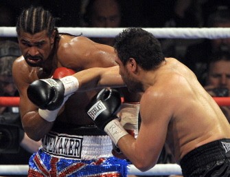 David Haye of Great Britain (L) vies with John Ruiz of the US during their WBA World Heavyweight fight at the MEN Arena in Manchester on April 3, 2010. AFP PHOTO David Haye of Great Britain (L) vies with John Ruiz of the US during their WBA World Heavyweight fight at the MEN Arena in Manchester on April 3, 2010. AFP PHOTO