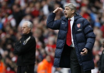 Wenger gestures during the English Premier League football match between Arsenal and Wolverhampton Wanderers on April 3, 2010. AFP PHOTO Wenger gestures during the English Premier League football match between Arsenal and Wolverhampton Wanderers on April 3, 2010. AFP PHOTO