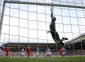 Birmingham City's Goalkeeper Joe Hart reaches for a shot by Liverpool's Steven Gerrard during a Premier League match at St Andrew's in Birmingham, West Midlands, England on April 4, 2010. AFP PHOTO Birmingham City's Goalkeeper Joe Hart reaches for a shot by Liverpool's Steven Gerrard during a Premier League match at St Andrew's in Birmingham, West Midlands, England on April 4, 2010. AFP PHOTO