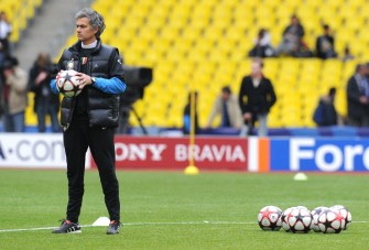 Jose Mourinho holds a ball during their official training session on the eve of their second leg Quarter final match against CSKA in Moscow on April 5, 2010. AFP PHOTO Jose Mourinho holds a ball during their official training session on the eve of their second leg Quarter final match against CSKA in Moscow on April 5, 2010. AFP PHOTO