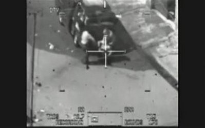 This image captured from a classified U.S. military video footage shows a wounded Iraqi person being loaded onto a van during a 2007 attack by Apache helicopters that killed a dozen people in Baghdad, including two Reuters news staff on July 12, 2007, and released to Reuters on April 5, 2010 by WikiLeaks, a group that promotes leaking to fight government and corporate corruption. This image captured from a classified U.S. military video footage shows a wounded Iraqi person being loaded onto a van during a 2007 attack by Apache helicopters that killed a dozen people in Baghdad, including two Reuters news staff on July 12, 2007, and released to Reuters on April 5, 2010 by WikiLeaks, a group that promotes leaking to fight government and corporate corruption.