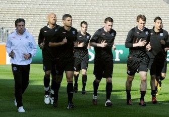 Lyon's coach Claude Puel (L) runs with Lyon's players during a training session, at Chaban-Delmas stadium, in Bordeaux, on the eve of the second leg of their Champions League quarter-final against Bordeaux. AFP PHOTO Lyon's coach Claude Puel (L) runs with Lyon's players during a training session, at Chaban-Delmas stadium, in Bordeaux, on the eve of the second leg of their Champions League quarter-final against Bordeaux. AFP PHOTO