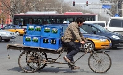A man delivers beer in Beijing. The World Bank said Wednesday that China's growing economy had helped developing countries in East Asia recover from the global crisis, but warned against exiting pro-growth policies too early A man delivers beer in Beijing. The World Bank said Wednesday that China's growing economy had helped developing countries in East Asia recover from the global crisis, but warned against exiting pro-growth policies too early