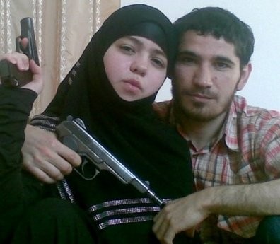 This undated handout photo provided by Newsteam shows 17 year-old suicide bomber Dzhennet Abdurakhmanova posing with her husband Umalat Magomedov who was killed in 2009. This undated handout photo provided by Newsteam shows 17 year-old suicide bomber Dzhennet Abdurakhmanova posing with her husband Umalat Magomedov who was killed in 2009.