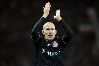 Bayern Munich's Dutch midfielder Arjen Robben celebrates scoring during the UEFA Champions League second leg quarter-final football match Manchester United vs FC Bayern Munich at Old Trafford in Manchester on April 7, 2010. AFP PHOTO Bayern Munich's Dutch midfielder Arjen Robben celebrates scoring during the UEFA Champions League second leg quarter-final football match Manchester United vs FC Bayern Munich at Old Trafford in Manchester on April 7, 2010. AFP PHOTO