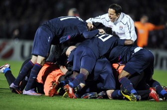 Lyon's players celebrate after winning the Champions League quarter-final football match against Bordeaux on April 7, 2010. AFP photo Lyon's players celebrate after winning the Champions League quarter-final football match against Bordeaux on April 7, 2010. AFP photo
