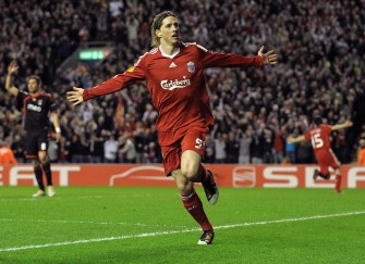 Torres celebrates after scoring the third goal during their UEFA Europa League Quarter Final Second Leg football match against Befica on April 8 2010. AFP PHOTO Torres celebrates after scoring the third goal during their UEFA Europa League Quarter Final Second Leg football match against Befica on April 8 2010. AFP PHOTO