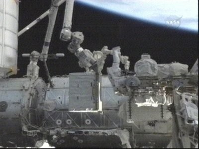In this image made from video and released by NASA, astronauts Rick Mastracchio, center, is seen preparing the external stowage platform on the International Space Station for the new ammonia tank during the first spacewalk on the International Space Station, Friday April 9, 2010 In this image made from video and released by NASA, astronauts Rick Mastracchio, center, is seen preparing the external stowage platform on the International Space Station for the new ammonia tank during the first spacewalk on the International Space Station, Friday April 9, 2010