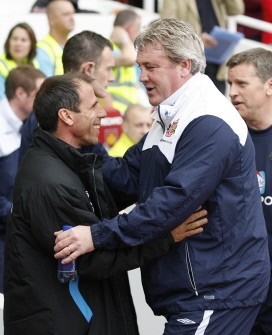Gianfranco Zola West Ham (L) greets Sunderland's Manager Steve Bruce before kick off during a Premier League match at Upton Park in London on April 10, 2010. AFP PHOTO Gianfranco Zola West Ham (L) greets Sunderland's Manager Steve Bruce before kick off during a Premier League match at Upton Park in London on April 10, 2010. AFP PHOTO