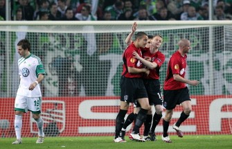 Fulham's Bobby Zamora (3rd R) celebrates scoring with Fulham's Irish midfielder Damien Duff (2nd R) during the UEFA Europa League second leg quarter-final football match VFL Wolfsburg vs Fulham FC on April 8, 2010. Fulham won the match 0-1. AFP PHOTO Fulham's Bobby Zamora (3rd R) celebrates scoring with Fulham's Irish midfielder Damien Duff (2nd R) during the UEFA Europa League second leg quarter-final football match VFL Wolfsburg vs Fulham FC on April 8, 2010. Fulham won the match 0-1. AFP PHOTO