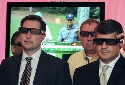In this photo released by Comcast, Mark Swan, left, Paul Hockenbery, center, and Topper Ray watch the first round of the Masters golf tournament in 3D on Thursday, April 8, 2010, at the Comcast Center in Philadelphia. (AFP Photo) In this photo released by Comcast, Mark Swan, left, Paul Hockenbery, center, and Topper Ray watch the first round of the Masters golf tournament in 3D on Thursday, April 8, 2010, at the Comcast Center in Philadelphia. (AFP Photo)