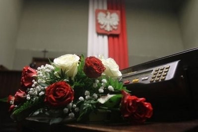 A wreath to mourn Polish President Lech Kaczynski and the other 95 people killed in a plane crash in Russia sits in the lower house of parliament in Warsaw A wreath to mourn Polish President Lech Kaczynski and the other 95 people killed in a plane crash in Russia sits in the lower house of parliament in Warsaw