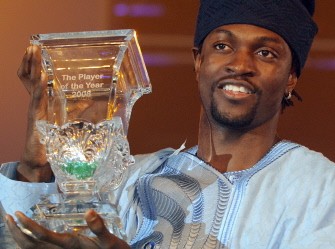 (FILES) A picture taken on February 10, 2009 shows then Arsenal striker and Togolese skipper Emmanuel Adebayor raising his trophy after being named African footballer of the year at the Confederation of African Football (CAF) award ceremony in Lagos. AFP photo (FILES) A picture taken on February 10, 2009 shows then Arsenal striker and Togolese skipper Emmanuel Adebayor raising his trophy after being named African footballer of the year at the Confederation of African Football (CAF) award ceremony in Lagos. AFP photo