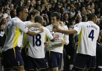 Gareth Bale (C) celebrates scoring his goal against Arsenal during a Premier League match at White Hart Lane in London on April 14, 2010. AFP PHOTO Gareth Bale (C) celebrates scoring his goal against Arsenal during a Premier League match at White Hart Lane in London on April 14, 2010. AFP PHOTO