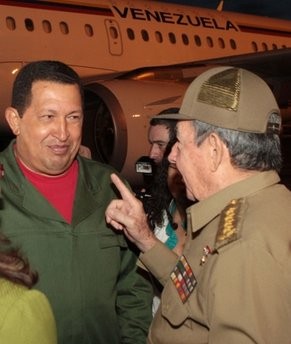 In this photo released by Miraflores Press Office, Venezuela's President Hugo Chavez, left, speaks with Cuba's President Raul Castro upon arrival to Jose Marti airport in Havana, early Thursday, April 15, 2010 In this photo released by Miraflores Press Office, Venezuela's President Hugo Chavez, left, speaks with Cuba's President Raul Castro upon arrival to Jose Marti airport in Havana, early Thursday, April 15, 2010