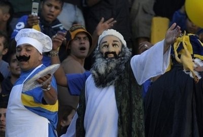 A soccer supporter in Argentina is dressed up as Al-Qaeda chief Osama Bin Laden holding a plastic chicken in Buenos Aires. A soccer supporter in Argentina is dressed up as Al-Qaeda chief Osama Bin Laden holding a plastic chicken in Buenos Aires.