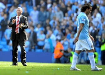 Sir Alex Ferguson (L) looks on as Manchester City's forward Carlos Tevez (R) leaves the pitch after the English Premier League football match between Manchester City and Manchester United at the City Of Manchester Stadium on April 17, 2010. AFP PHOTO Sir Alex Ferguson (L) looks on as Manchester City's forward Carlos Tevez (R) leaves the pitch after the English Premier League football match between Manchester City and Manchester United at the City Of Manchester Stadium on April 17, 2010. AFP PHOTO