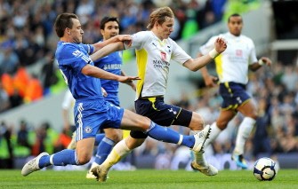Chelsea's defender John Terry (L) tackles Tottenham's striker Roman Pavlyuchenko (R) which leads to Terry receiving his first yellow card during the English Premier League football match between Tottenham Hotspur and Chelsea at White Hart Lane in London on April 17, 2010. AFP PHOTO Chelsea's defender John Terry (L) tackles Tottenham's striker Roman Pavlyuchenko (R) which leads to Terry receiving his first yellow card during the English Premier League football match between Tottenham Hotspur and Chelsea at White Hart Lane in London on April 17, 2010. AFP PHOTO