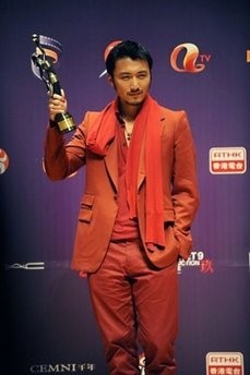 Actor Nicholas Tse of Hong Kong holds the Best Supporting Actor trophy for his role in 'Bodyguards and Assassins' at the Hong Kong Film Awards. Actor Nicholas Tse of Hong Kong holds the Best Supporting Actor trophy for his role in 'Bodyguards and Assassins' at the Hong Kong Film Awards.