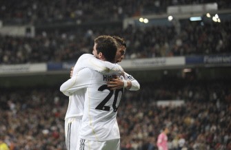 Real Madrid's Argentinian forward Gonzalo Higuain (L) celebrates with Real Madrid's Portuguese forward Cristiano Ronaldo after scoring during the Spanish League football match Real Madrid against Valencia at the Santiago Bernabeu stadium in Madrid on April 18, 2010. AFP photo Real Madrid's Argentinian forward Gonzalo Higuain (L) celebrates with Real Madrid's Portuguese forward Cristiano Ronaldo after scoring during the Spanish League football match Real Madrid against Valencia at the Santiago Bernabeu stadium in Madrid on April 18, 2010. AFP photo