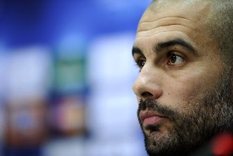 Barcellona's coach Josep Guardiola looks on during a press conference a day before their Champion's League first leg semifinal football match against Inter Milan, in Mian's San Siro Stadium on April 19, 2009. AFP PHOTO Barcellona's coach Josep Guardiola looks on during a press conference a day before their Champion's League first leg semifinal football match against Inter Milan, in Mian's San Siro Stadium on April 19, 2009. AFP PHOTO