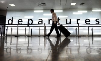 Passengers arrive at Glasgow airport as Scottish airspace re-opened on April 20, 2010. AFP photo Passengers arrive at Glasgow airport as Scottish airspace re-opened on April 20, 2010. AFP photo