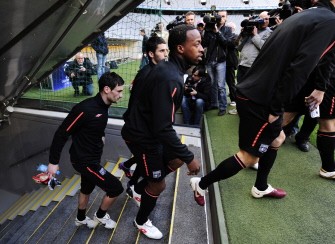 Lyon striker Sydney Govou (C) comes onto the pitch for a training session at the Allianz Arena in the southern German city of Munich April 20, 2010, on the eve of the FC Bayern Munich vs Olympique Lyonnais UEFA Champions League first leg semi-final football match. AFP PHOTO Lyon striker Sydney Govou (C) comes onto the pitch for a training session at the Allianz Arena in the southern German city of Munich April 20, 2010, on the eve of the FC Bayern Munich vs Olympique Lyonnais UEFA Champions League first leg semi-final football match. AFP PHOTO