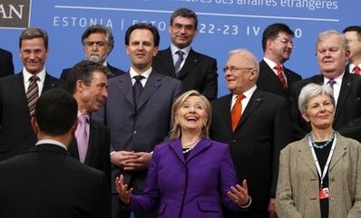 U.S. Secretary of State Hillary Clinton, center, gestures during a group photo at a meeting of NATO foreign ministers in Tallinn, Estonia, Thursday, April 22, 2010. U.S. Secretary of State Hillary Clinton, center, gestures during a group photo at a meeting of NATO foreign ministers in Tallinn, Estonia, Thursday, April 22, 2010.