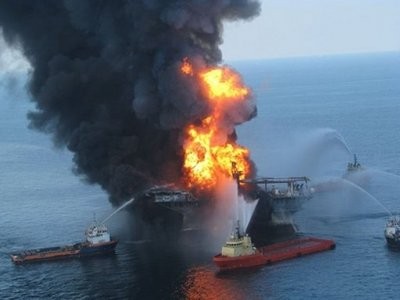 US Coast Guard issued photo shows fire boat response crews battling the blazing remains of an oil rig off the Louisiana coastline. US Coast Guard issued photo shows fire boat response crews battling the blazing remains of an oil rig off the Louisiana coastline.
