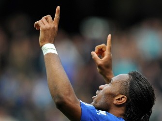 Chelsea's Ivorian striker Didier Drogba celebrates after setting up the opening goal of the English Premier League football match between Chelsea and Stoke City at Stamford Bridge in London on April 25, 2010. AFP PHOTO Chelsea's Ivorian striker Didier Drogba celebrates after setting up the opening goal of the English Premier League football match between Chelsea and Stoke City at Stamford Bridge in London on April 25, 2010. AFP PHOTO