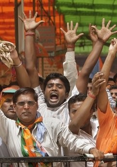 Members of India's opposition Bharatiya Janata Party (BJP) shout slogans during a rally against price rise in New Delhi, India, Wednesday, April 21, 2010. Members of India's opposition Bharatiya Janata Party (BJP) shout slogans during a rally against price rise in New Delhi, India, Wednesday, April 21, 2010.